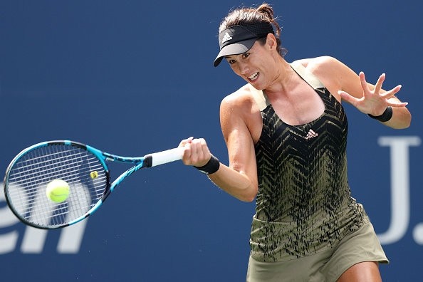  穆古鲁扎的教练是谁 